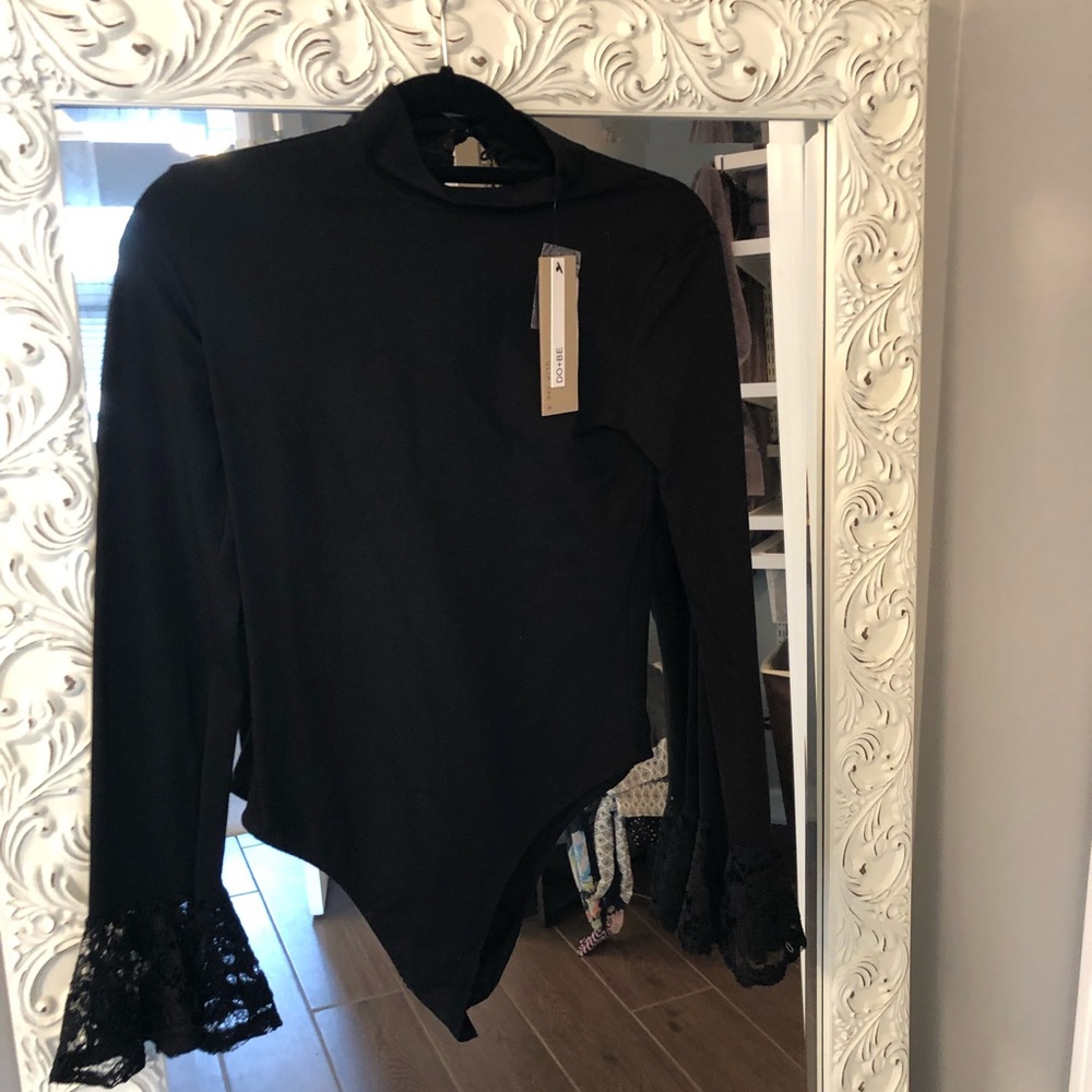 A black lace body suit